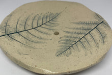 Load image into Gallery viewer, Round ceramic tile with leaf design on a white background