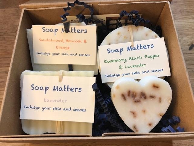 Three soaps and a small heart soap