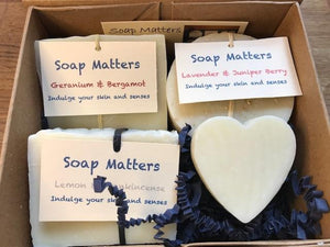Three soaps and a small heart soap